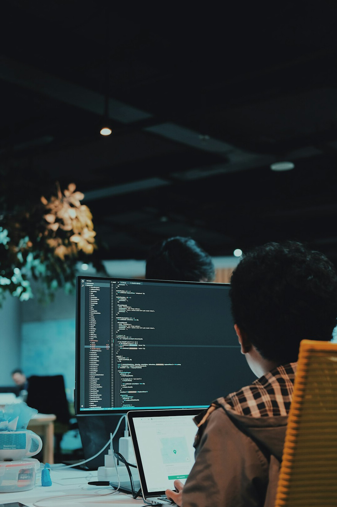 person analyzing data on computer